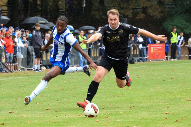 DEU, DFL, 2. FBL, Frohnauer SC vs Hertha BSC, 04.07.2026, Frohnau, Berlin, DEU, DFL, 2. FBL, Frohnauer SC vs Hertha BSC, Jelani Ndi (Hertha BSC Berlin 28), Nils Ehret (Frohnauer SC 11) DFL - regulations prohibit any use of Photographs as image sequences and or quasi-video *** DEU, DFL, 2nd Regional League, Frohnauer SC vs. Hertha BSC, July 4, 2026, Frohnau, Berlin, DEU, DFL, 2nd Regional League, Frohnauer SC vs. Hertha BSC, Jelani Ndi (Hertha BSC Berlin) 28, Nils Ehret (Frohnauer SC) 11. DFL regulations prohibit any use of photographs as image sequences and or quasi-video. nordphotoxGmbHx xEngler nph00076