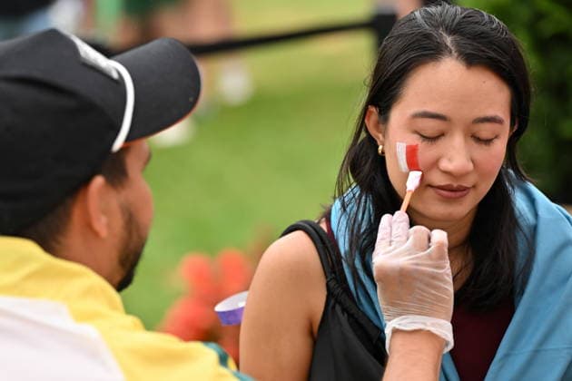 July 4, 2026, Toronto, On, Canada: A fan gets her face painted with Team Canada colours prior to the start of Canada s World Cup soccer match against Morocco at FIFA Fan Fest in Toronto on Saturday, July 4, 2026. Canada News - July 4, 2026  - ZUMAc35_ 20260704_zaf_c35_001 Copyright: xJonxBlackerx