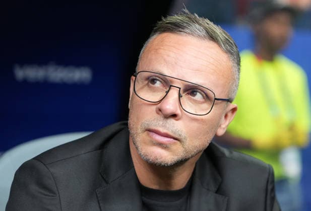 (260705) -- HOUSTON, July 5, 2026 -- Mohamed Ouahbi, head coach of Morocco, reacts before the round of 16 match between Canada and Morocco at the 2026 FIFA World Cup, WM, Weltmeisterschaft, Fussball at Houston Stadium in Houston, the United States, July 4, 2026. ) (SP)U.S.-HOUSTON-FOOTBALL-FIFA WORLD CUP-ROUND OF 16-CAN VS MAR XiaoxYijiu 