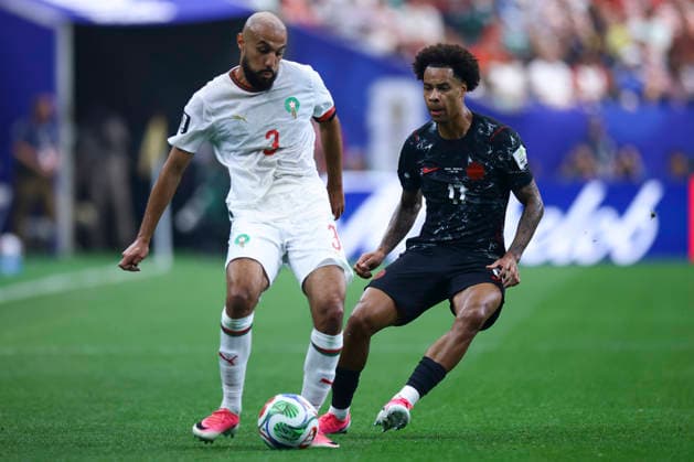 Canada Tajon Buchanan (R) vies for the ball against Morocco s Noussair Mazraoui during the FIFA World Cup, WM, Weltmeisterschaft, Fussball 2026 Round of 16 soccer match between Morocco and Canada at Houston Stadium, in United States, 4 July 2026. Canada - Morocco !ACHTUNG: NUR REDAKTIONELLE NUTZUNG!  Copyright: xCarlosxRamírezx GRAF1195 0860728602st