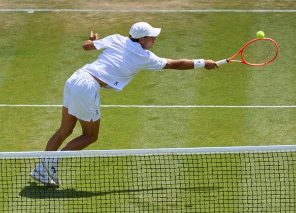 2026 Wimbledon, July 04, Day 6 LONDON, - JULY 4: Flavio Cobolli of Italy plays a shot against Karen Kachanov in the third round during the 2026 Wimbledon, July 04, Day 6 at The all England club, Wimbledon on July 4, 2026 in London, GBR. London The all England club, Wimbledon GBR Copyright: xPeterxvanxdenxBerg ISIxPhotosx 9451
