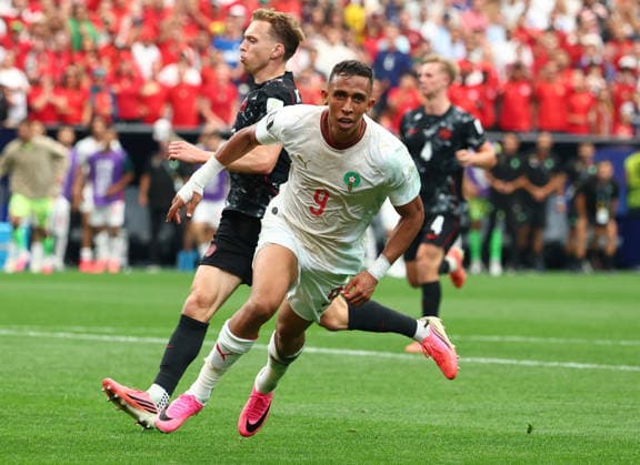 Morocco s Soufiane Rahimi (9) celebrates after scoring a goal against Canada in the second half of a Round of 16 FIFA World Cup, WM, Weltmeisterschaft, Fussball match at Houston Stadium in Houston, Texas, on Saturday, July 4, 2026. Morocco won the match 3-0.  HOU20260704921 CHRISTIANxBRUNSKILL