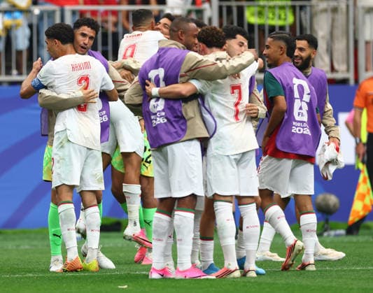 Morocco players celebrate after a goal by Azzedine Ounahi against Canada in the second half of a Round of 16 FIFA World Cup, WM, Weltmeisterschaft, Fussball match at Houston Stadium in Houston, Texas, on Saturday, July 4, 2026. Morocco won the match 3-0.  HOU20260704919 CHRISTIANxBRUNSKILL