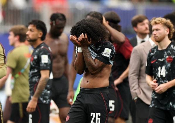 (260705) -- HOUSTON, July 5, 2026 -- Jayden Nelson (front) of Canada reacts after the round of 16 match between Canada and Morocco at the 2026 FIFA World Cup, WM, Weltmeisterschaft, Fussball at Houston Stadium in Houston, the United States, July 4, 2026. ) (SP)U.S.-HOUSTON-FOOTBALL-FIFA WORLD CUP-ROUND OF 16-CAN VS MAR LixMing 