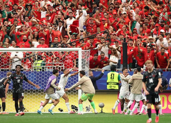 (260705) -- HOUSTON, July 5, 2026 -- Soufiane Rahimi (4th L) of Morocco celebrates after scoring during the round of 16 match between Canada and Morocco at the 2026 FIFA World Cup, WM, Weltmeisterschaft, Fussball at Houston Stadium in Houston, the United States, July 4, 2026. ) (SP)U.S.-HOUSTON-FOOTBALL-FIFA WORLD CUP-ROUND OF 16-CAN VS MAR LixMing 