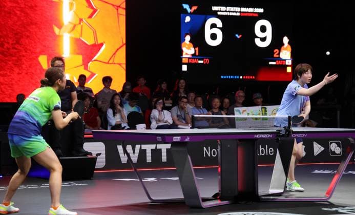 (260705) -- ONTARIO, July 5, 2026 -- Kuai Man (R) of China serves during the women s singles quarterfinal match against Sato Hitomi of Japan at the WTT United States Smash 2026 in Ontario, California, the United States, July 4, 2026. (Photo by Xinhua) (SP)U.S.-ONTARIO Table tennis, Tischtennis WTT SMASH 2026-WOMEN S SINGLES ZengxHui 