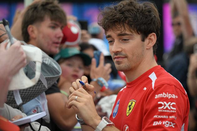 RECORD DATE NOT STATED 5th July 2026; Silverstone Circuit, Northamptonshire, England; FIA Formula 1 2026 British F1 Grand Prix; Race Day; Charles Leclerc of Ferrari signs autographs on arrival at Silverstone SimonxWest