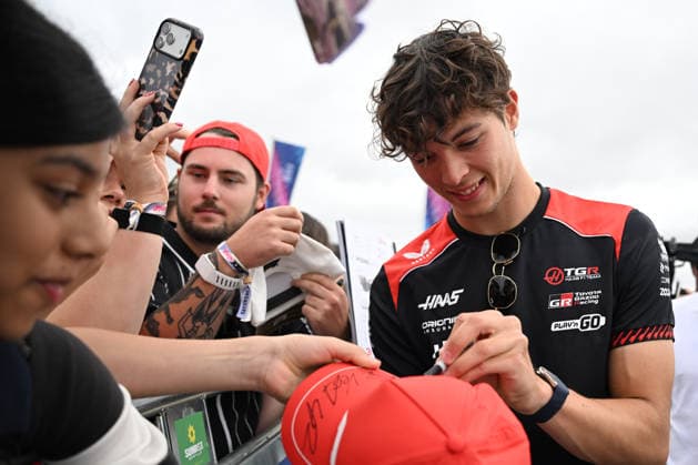 RECORD DATE NOT STATED 5th July 2026; Silverstone Circuit, Northamptonshire, England; FIA Formula 1 2026 British F1 Grand Prix; Race Day; Oliver Bearman of Haas signs autographs on arrival at Silverstone SimonxWest