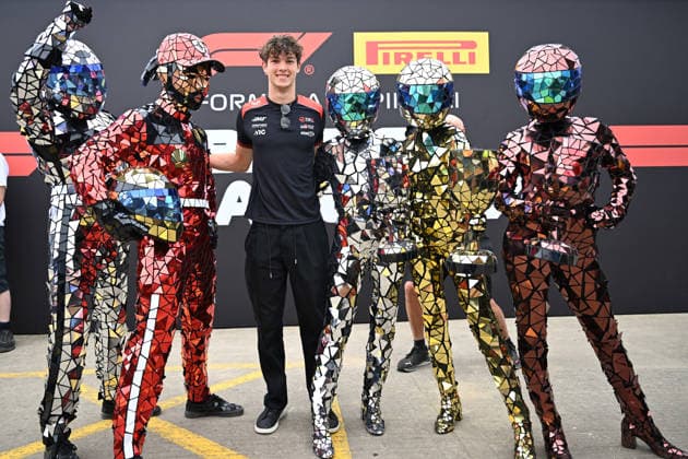 RECORD DATE NOT STATED 5th July 2026; Silverstone Circuit, Northamptonshire, England; FIA Formula 1 2026 British F1 Grand Prix; Race Day; Oliver Bearman of Haas with glitterball characters SimonxWest
