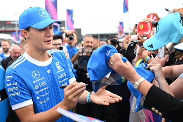 RECORD DATE NOT STATED 5th July 2026; Silverstone Circuit, Northamptonshire, England; FIA Formula 1 2026 British F1 Grand Prix; Race Day; George Russell of Mercedes signs autographs on arrival at Silverstone SimonxWest