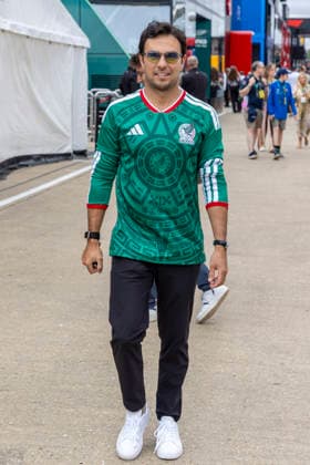 RECORD DATE NOT STATED 5th July 2026; Silverstone Circuit, Northamptonshire, England; FIA Formula 1 2026 British F1 Grand Prix; Race Day; Cadillac Formula 1 Team driver Sergio Perez arrives wearing a Mexico football shirt TimxWilliams
