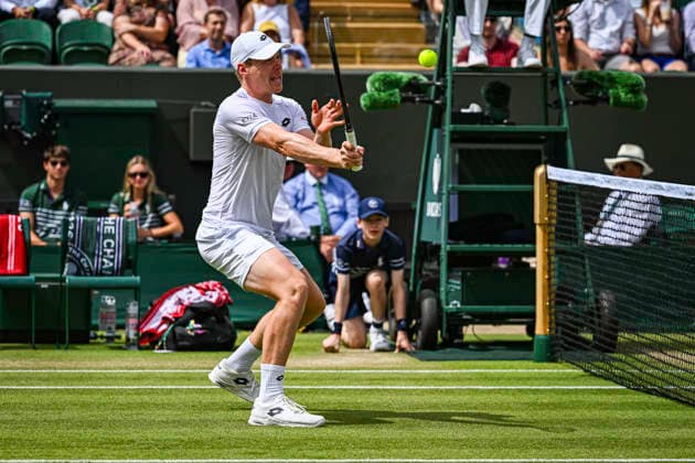 RECORD DATE NOT STATED 5th July 2026; All England Lawn Tennis and Croquet Club, London, England; Wimbledon Tennis Tournament, Day Seven; Harri Heliovaara (FIN) plays a volley in his third round match with Henry Patten (GBR) against Adam Pavlasek (CZE) and Patrik Riki (CZE) GodfreyxPitt