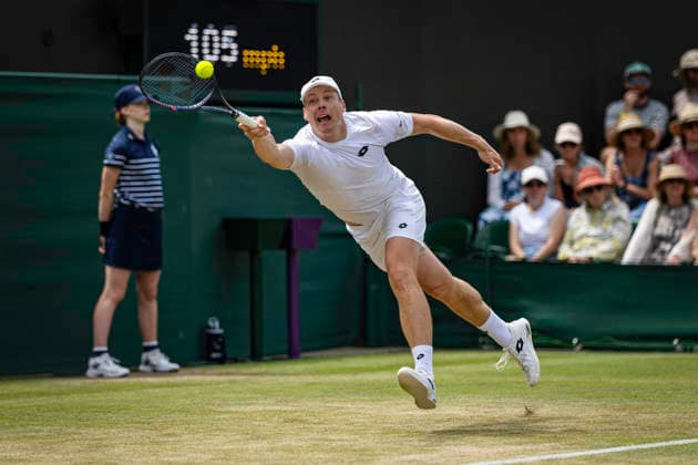 RECORD DATE NOT STATED 5th July 2026; All England Lawn Tennis and Croquet Club, London, England; Wimbledon Tennis Tournament, Day Seven; Harri Heliovaara (FIN) plays a forehand in his third round match with Henry Patten (GBR) against Adam Pavlasek (CZE) and Patrik Riki (CZE) GodfreyxPitt