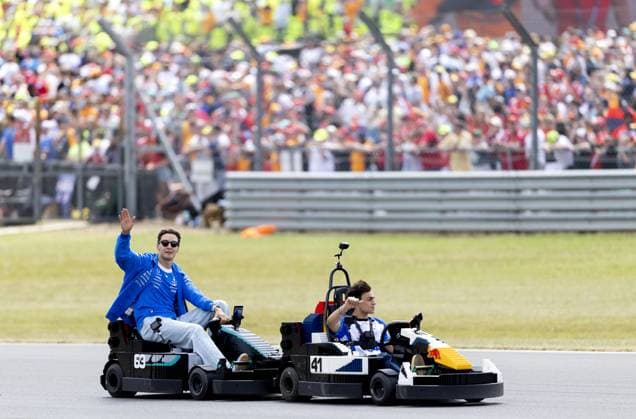 SILVERSTONE - George Russell (Mercedes) and Arvid Lindblad (Racing Bulls) in a LEGO kart during the drivers parade at the Silverstone circuit for the British Grand Prix. SANDER KONING ANP xVIxANPxSportx xxANPxIVx 562860865 originalFilename: 562860865.jpg