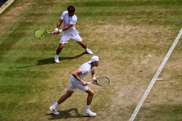 July 5, 2026, London, London, Great Britain: Hendrik Jebens of Germany, Ray Ho of Chinese Taipei returns with backhand during The Championships Wimbledon , 5.7.2026 in London (All England Lawn Tennis and Croquet Club), Great Britain Tennis 2026: Grand Slam: The Championships Wimbledon: 6th Day: 3rd Round: ANDREOZZI GUINARD 7:6 6:4 HO JEBENS  - ZUMAs343 20260705_zsp_s343_096 Copyright: xMathiasxSchulzx