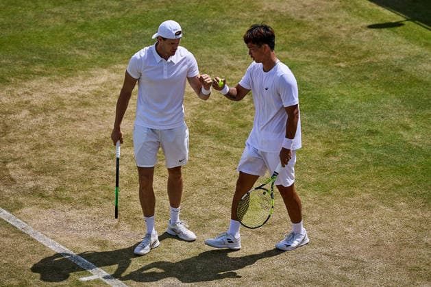 July 5, 2026, London, London, Great Britain: Hendrik Jebens of Germany, Ray Ho of Chinese Taipei shake hands during The Championships Wimbledon , 5.7.2026 in London (All England Lawn Tennis and Croquet Club), Great Britain Tennis 2026: Grand Slam: The Championships Wimbledon: 6th Day: 3rd Round: ANDREOZZI GUINARD 7:6 6:4 HO JEBENS  - ZUMAs343 20260705_zsp_s343_099 Copyright: xMathiasxSchulzx