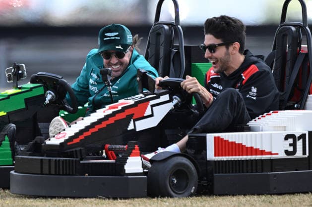 RECORD DATE NOT STATED 5th July 2026; Silverstone Circuit, Northamptonshire, England; FIA Formula 1 2026 British F1 Grand Prix; Race Day; Fernando Alonso of Aston Martin and Esteban Ocon of Haas race over the grass during the lego car race SimonxWest
