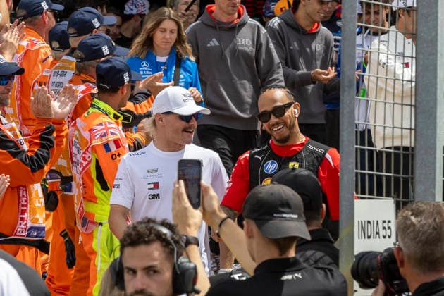 RECORD DATE NOT STATED 5th July 2026; Silverstone Circuit, Northamptonshire, England; FIA Formula 1 2026 British F1 Grand Prix; Race Day; Cadillac Formula 1 Team driver Valtteri Bottas and Scuderia Ferrari HP driver Lewis Hamilton walk out for the drivers parade TimxWilliams