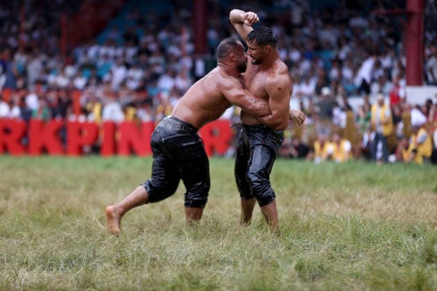 665th Historic Kirkpinar Oil Wrestling Festival in Turkiye s Edirne EDIRNE, TURKIYE - JULY 5: Feyzullah Akturk and Mustafa Tas compete during semifinal match of the 665th Historic Kirkpinar Oil Wrestling Festival at the Sarayici Er Meydani wrestling grounds in Edirne, Turkiye, on July 5, 2026. Ozgun Tiran Anadolu Edirne Turkey. Editorial use only. Please get in touch for any other usage.  Copyright: x2026xAnadoluxOzgunxTiranx