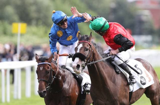 05.07.2026, GER,Reitsport, Rennen 8 IDEE 157. Deutsches Derby , Derby Meeting Hamburg - Galopprennen, Hamburger Renn-Club e.V., Galopprennbahn Hamburg Horn, Hamburg Der drittplatzierte Salitos (IRE) ( 03) geritten von Bauyrzhan Murzabayev klatscht mit dem Sieger des 157. Deutsches Derby Dardanos ( 15) geritten von Wladimir Panov ab *** July 5, 2026, GER, Equestrian Sports, Race 8 IDEE 157 German Derby, Derby Meeting Hamburg Horse Race, Hamburger Renn Club e.V., Hamburg Horn Racetrack, Hamburg: Salitos IRE 03, who finished third, ridden by Bauyrzhan Murzabayev, high-fives the winner of the 157th German Derby, Dardanos 15, ridden by Wladimir Panov nordphotoxGmbHx xTauchnitz nph00059