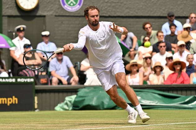 Wimbledon Tennis Championships 2026 - Day 7 LONDON, UNITED KINGDOM - JULY 5: Roman Safiullin plays in the Men s singles fourth round match against Novak Djokovic (not seen) of Serbia during day seven of The Wimbledon Tennis Championships at All England Lawn Tennis and Croquet Club on July 05, 2026 in London, United Kingdom. Ray Tang Anadolu London United Kingdom. Editorial use only. Please get in touch for any other usage.  Copyright: x2026xAnadoluxRayxTangx