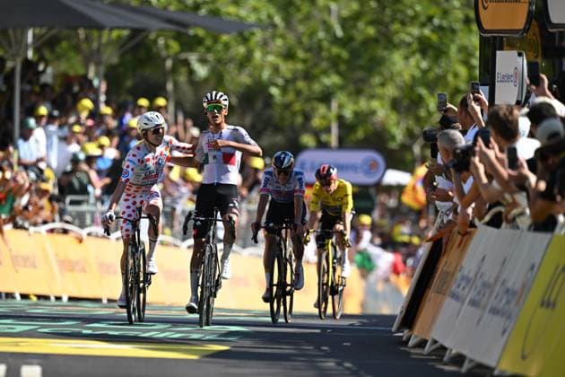 Slovenian Tadej Pogacar of UAE Team Emirates-XRG, Mexican Isaac Del Toro of UAE Team Emirates-XRG and pictured as they crosses the finish line of the second stage of the 2026 Tour de France cycling race, a stage of 182km from Tarragona to Barcelona, Sunday 05 July 2026. The 113th edition of the Tour de France starts on Saturday 4 July in Barcelona, Spain, and will finish in Paris, France on the 26th of July. DAVIDxPINTENS  x180438387x