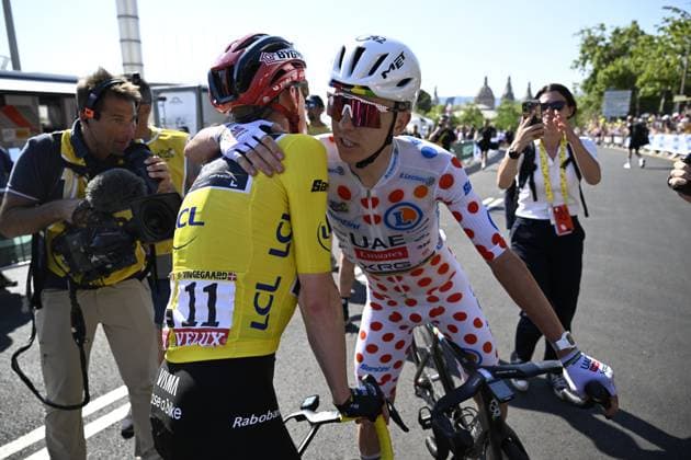 Danish Jonas Vingegaard of Team Visma-Lease a Bike, Slovenian Tadej Pogacar of UAE Team Emirates-XRG and pictured after the second stage of the 2026 Tour de France cycling race, a stage of 182km from Tarragona to Barcelona, Sunday 05 July 2026. The 113th edition of the Tour de France starts on Saturday 4 July in Barcelona, Spain, and will finish in Paris, France on the 26th of July. JASPERxJACOBS  x180438783x