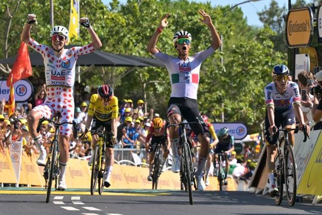 Slovenian Tadej Pogacar of UAE Team Emirates-XRG, Mexican Isaac Del Toro of UAE Team Emirates-XRG and pictured as they cross the finish line of the second stage of the 2026 Tour de France cycling race, a stage of 182km from Tarragona to Barcelona, Sunday 05 July 2026. The 113th edition of the Tour de France starts on Saturday 4 July in Barcelona, Spain, and will finish in Paris, France on the 26th of July. DAVIDxPINTENS  x180438968x