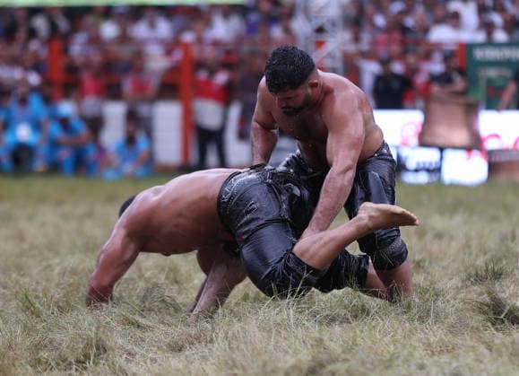 Erkan Tas wins chief wrestler title at 665th Historic Kirkpinar Oil Wrestling Festival EDIRNE, TURKIYE - JULY 5: Erkan Tas competes against Feyzullah Akturk in the final to become the chief wrestler during the 665th Historic Kirkpinar Oil Wrestling Festival at the Sarayici Er Meydani wrestling grounds in Edirne, Turkiye, on July 5, 2026. Ozgun Tiran Anadolu Edirne Turkey. Editorial use only. Please get in touch for any other usage.  Copyright: x2026xAnadoluxOzgunxTiranx