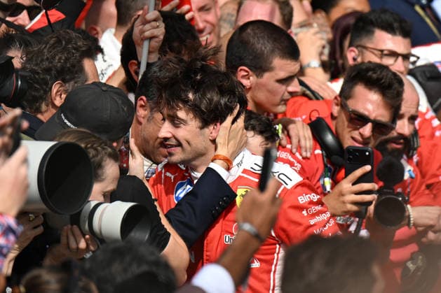 RECORD DATE NOT STATED 5th July 2026; Silverstone Circuit, Northamptonshire, England; FIA Formula 1 2026 British F1 Grand Prix; Race Day; Charles Leclerc of Ferrari celebrates with the ferrari team after winning the British Grand Prix SimonxWest