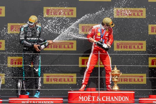 RECORD DATE NOT STATED 5th July 2026; Silverstone Circuit, Northamptonshire, England; FIA Formula 1 2026 British F1 Grand Prix; Race Day; Scuderia Ferrari HP driver Charles Leclerc and Mercedes-AMG Petronas F1 Team driver George Russell sprey each other with champagne TimxWilliams