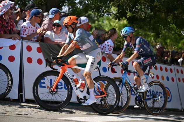 Tour de France 2026 Stage 2 BARCELONA, SPAIN - JULY 05 : Kwiatkowski Michal (POL) of Netcompany INEOS, Van Baarle Dylan (NED) of Soudal Quick-Step in action during stage 2 of the 113rd edition of Tour de France an UCI World Tour 2.UWT cycling road race stage for Men Elite of 182 km with start in Tarragona and finish in Barcelona on July 5, 2026 in Barcelona, Spain, 05 07 2026 ( Motordriver Kurt Vandenborre - Barcelona Spain  Copyright: xSzymonxGruchalskix