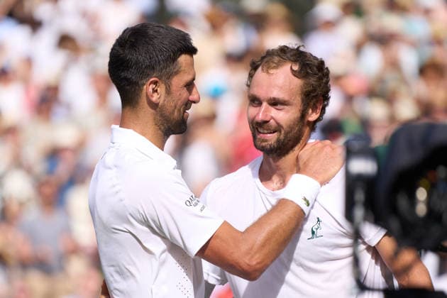 2026 Wimbledon, July 05, Day 7 LONDON, - JULY 5: Novak Djokovic of Serbia at the net with Roman Safiullin in the fourth round during the 2026 Wimbledon, July 05, Day 7 at The all England club, Wimbledon on July 5, 2026 in London,GBR. London The all England club, Wimbledon GBR Copyright: xPeterxvanxdenxBerg ISIxPhotosx 9462