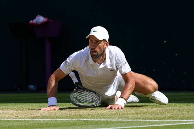 2026 Wimbledon, July 05, Day 7 LONDON, - JULY 5: Novak Djokovic of Serbia slips on Centre court against Roman Safiullin in the fourth round during the 2026 Wimbledon, July 05, Day 7 at The all England club, Wimbledon on July 5, 2026 in London,GBR. London The all England club, Wimbledon GBR Copyright: xPeterxvanxdenxBerg ISIxPhotosx 9462
