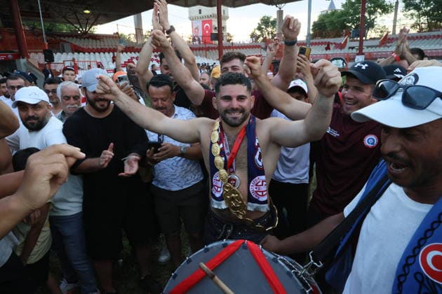 Erkan Tas wins chief wrestler title at 665th Historic Kirkpinar Oil Wrestling Festival EDIRNE, TURKIYE - JULY 5: Erkan Tas celebrates wearing his golden belt after winning the 665th Historic Kirkpinar Oil Wrestling Festival at the Sarayici Er Meydani wrestling grounds in Edirne, Turkiye, on July 5, 2026. Cihan Demirci Anadolu Edirne Turkey. Editorial use only. Please get in touch for any other usage.  Copyright: x2026xAnadoluxCihanxDemircix