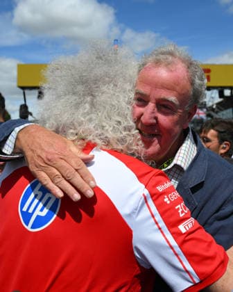 F1 Grand Prix of Great Britain Jeremy Clarkson embraces Sir Brian May during the Formula 1 Pirelli British Grand Prix 2026 at Silverstone Circuit, Towcester, on July 5, 2026. Towcester Northants United Kingdom  Copyright: xMIxNewsx originalFilename:fletcher-formula1260705_npNWD.jpg