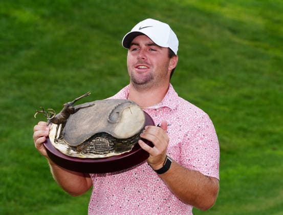 SILVIS, IL - JULY 05: PGA, Golf Herren golfer Chris Gotterup poses with the trophy after winning the John Deere Classic on July 5, 2026, at TPC Deere Run in Silvis, Illinois. (Photo by Brian Spurlock Icon Sportswire) GOLF: JUL 05 PGA John Deere Classic EDITORIAL USE ONLY Icon2607057