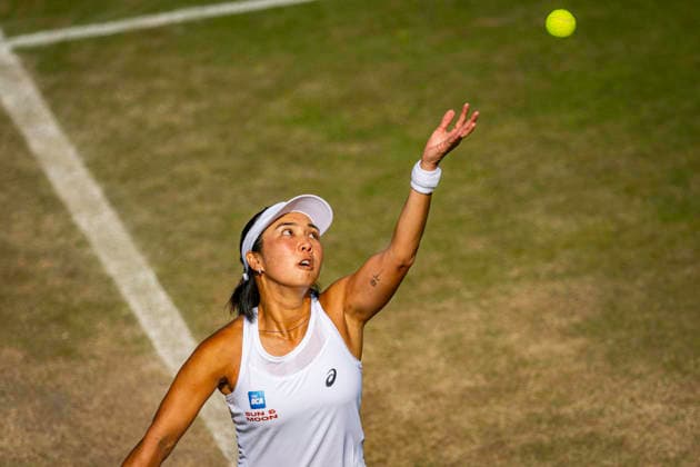 RECORD DATE NOT STATED 5th July 2026; All England Lawn Tennis and Croquet Club, London, England; Wimbledon Tennis Tournament, Day Seven; Aldila Sutjadi (INA) serves in her second round match with Guido Andreozzi (ARG) against JJ Tracy (USA) and Anna Danilina (KAZ) GodfreyxPitt