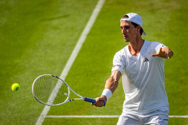 RECORD DATE NOT STATED 5th July 2026; All England Lawn Tennis and Croquet Club, London, England; Wimbledon Tennis Tournament, Day Seven; Joe Salisbury (GBR) plays a volley in his second round match with Leylah Fernandez (CAN) against Ben Jones (GBR) and Maia Lumsden (GBR) GodfreyxPitt