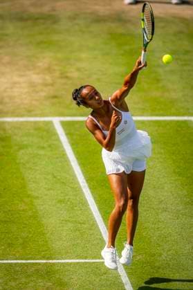 RECORD DATE NOT STATED 5th July 2026; All England Lawn Tennis and Croquet Club, London, England; Wimbledon Tennis Tournament, Day Seven; Leylah Fernandez (CAN) plays a smash in her second round match with Joe Salisbury (GBR) against Ben Jones (GBR) and Maia Lumsden (GBR) GodfreyxPitt
