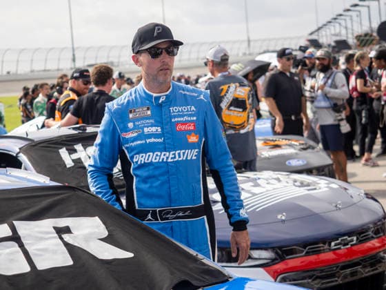 JOLIET, IL - JULY 05: Denny Hamlin ( 11 Joe Gibbs Racing Progressive Insurance Toyota) looks on before the NASCAR, Motorsport, USA Cup Series eero 400 on July 5, 2026, at Chicagoland Speedway in Joliet, IL. (Photo by Joseph Weiser Icon Sportswire) AUTO: JUL 05 NASCAR Cup Series eero 400 EDITORIAL USE ONLY Icon260705025400