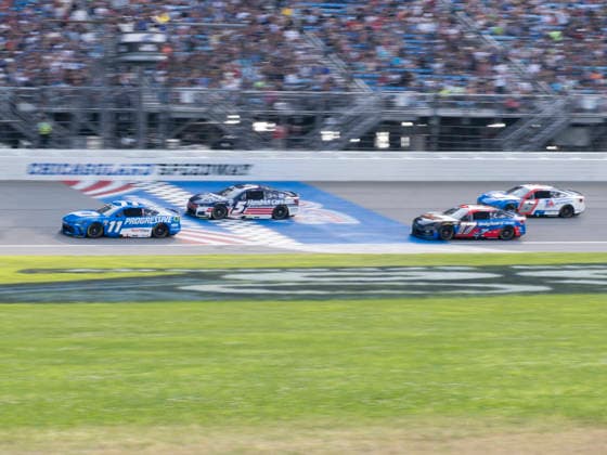 JOLIET, IL - JULY 05: Denny Hamlin ( 11 Joe Gibbs Racing Progressive Insurance Toyota) leads Kyle Larson ( 5 Hendrick Motorsports HendrickCars.com Chevrolet) and the rest of the pack during the NASCAR, Motorsport, USA Cup Series eero 400 on July 5, 2026, at Chicagoland Speedway in Joliet, IL. (Photo by Joseph Weiser Icon Sportswire) AUTO: JUL 05 NASCAR Cup Series eero 400 EDITORIAL USE ONLY Icon260705031400