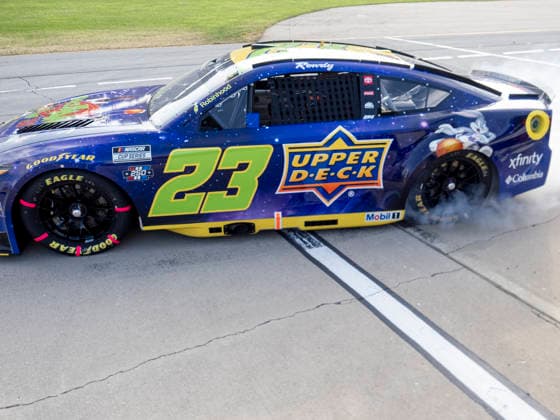 JOLIET, IL - JULY 05: Bubba Wallace ( 23 23XI Racing Upper Deck Space Jam 30th Anniversary Toyota) spins out exiting his pit stall during the NASCAR, Motorsport, USA Cup Series eero 400 on July 5, 2026, at Chicagoland Speedway in Joliet, IL. (Photo by Joseph Weiser Icon Sportswire) AUTO: JUL 05 NASCAR Cup Series eero 400 EDITORIAL USE ONLY Icon260705041400