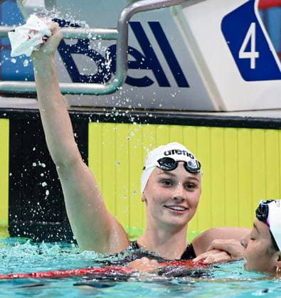 July 5, 2026, Montreal, Pq, Canada: Summer McIntosh, left, reacts after setting a new world in the women s 200m butterfly final at the Canadian Swimming Trials in Montreal, on Sunday, July 5, 2026. Canada News - July 5, 2026  - ZUMAc35_ 20260705_zaf_c35_055 Copyright: xGrahamxHughesx