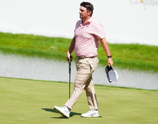 SILVIS, IL - JULY 05: PGA, Golf Herren golfer Chris Gotterup walks off the 18th green after finishing during the final round of the John Deere Classic on July 5, 2026, at TPC Deere Run in Silvis, Illinois. (Photo by Brian Spurlock Icon Sportswire) GOLF: JUL 05 PGA John Deere Classic EDITORIAL USE ONLY Icon26070548