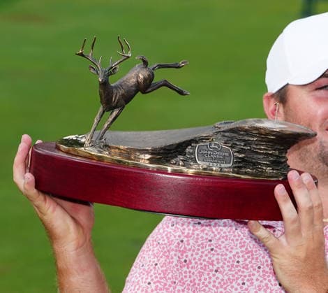 SILVIS, IL - JULY 05: A close up of PGA, Golf Herren golfer Chris Gotterup holding the trophy after he won the John Deere Classic on July 5, 2026, at TPC Deere Run in Silvis, Illinois. (Photo by Brian Spurlock Icon Sportswire) GOLF: JUL 05 PGA John Deere Classic EDITORIAL USE ONLY Icon26070553