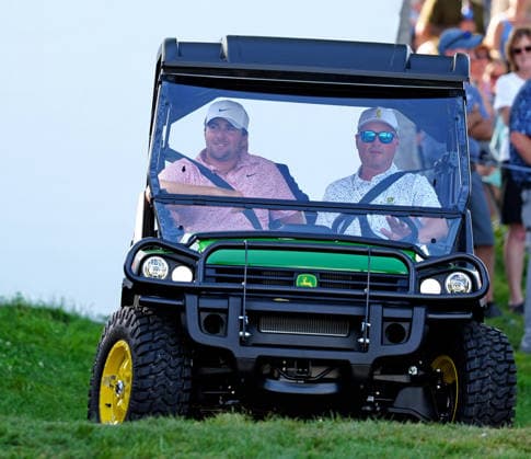 SILVIS, IL - JULY 05: PGA, Golf Herren golfer Chris Gotterup is driven in a John Deere Gator utility vehicle to the trophy presentation after he won the John Deere Classic on July 5, 2026, at TPC Deere Run in Silvis, Illinois. (Photo by Brian Spurlock Icon Sportswire) GOLF: JUL 05 PGA John Deere Classic EDITORIAL USE ONLY Icon26070554