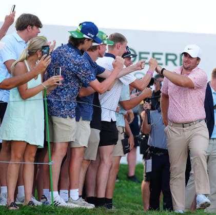 SILVIS, IL - JULY 05: PGA, Golf Herren golfer Chris Gotterup high fives the fans on the way to the trophy presentation after he won the John Deere Classic on July 5, 2026, at TPC Deere Run in Silvis, Illinois. (Photo by Brian Spurlock Icon Sportswire) GOLF: JUL 05 PGA John Deere Classic EDITORIAL USE ONLY Icon26070556
