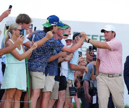 SILVIS, IL - JULY 05: PGA, Golf Herren golfer Chris Gotterup high fives the fans on the way to the trophy presentation after he won the John Deere Classic on July 5, 2026, at TPC Deere Run in Silvis, Illinois. (Photo by Brian Spurlock Icon Sportswire) GOLF: JUL 05 PGA John Deere Classic EDITORIAL USE ONLY Icon26070558