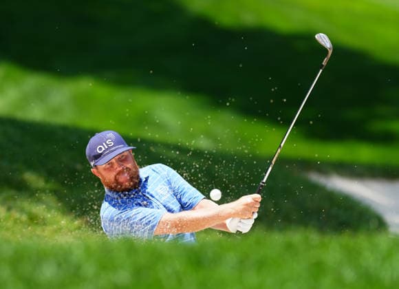SILVIS, IL - JULY 05: PGA, Golf Herren golfer Zac Blair plays a sand shot out of a green side bunker on the 9th hole during the final round of the John Deere Classic on July 5, 2026, at TPC Deere Run in Silvis, Illinois. (Photo by Brian Spurlock Icon Sportswire) GOLF: JUL 05 PGA John Deere Classic EDITORIAL USE ONLY Icon26070565